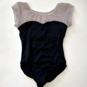 MotionWear black capped sleeves leotard with printed Paris skyline.